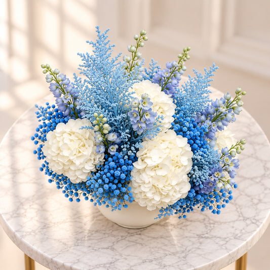 Top view of an elegant blue and white baby boy flower arrangement
