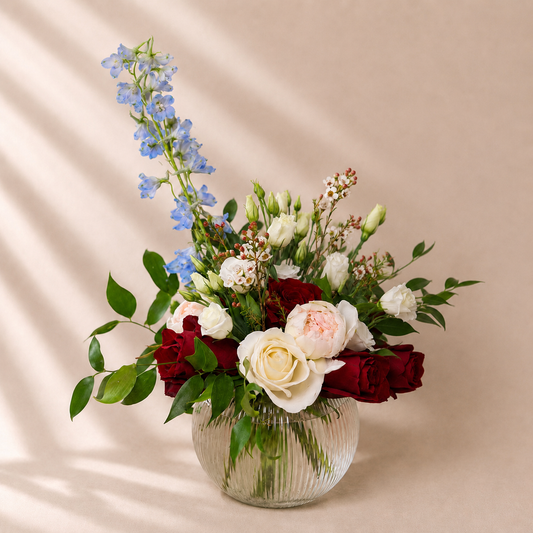 Blue Note luxury floral centerpiece handcrafted with fresh flowers for same-day delivery in Toronto.