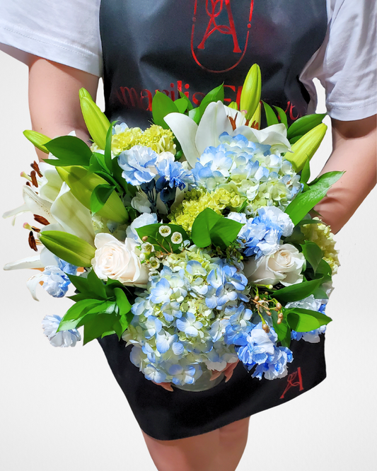 Blue and white flower arrangement with Toronto flower delivery