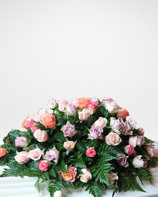 Blush Reminiscence floral arrangement with soft pink roses and greenery in Toronto