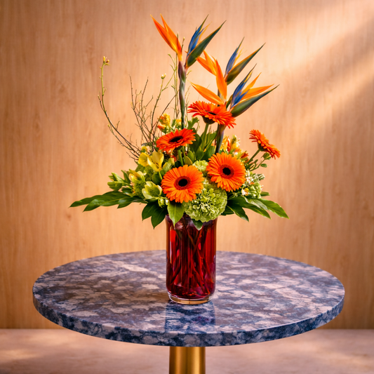 exotic tropical flower arrangement Toronto with orange gerberas and greenery