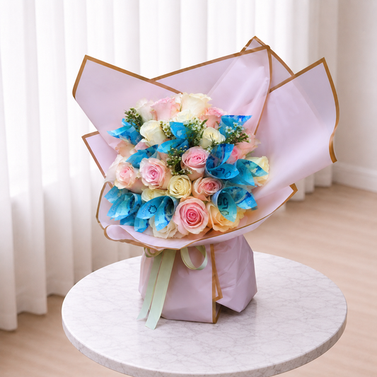 Side-angle view of Gilded Petals cash bouquet with pink and white roses on a marble table