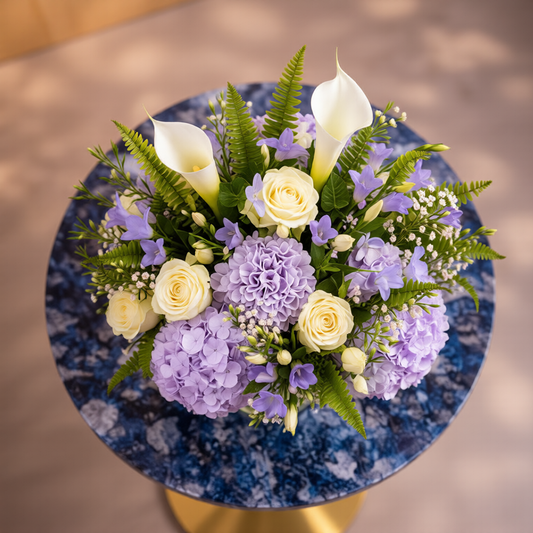 Lavender hydrangeas and white calla lilies floral arrangement