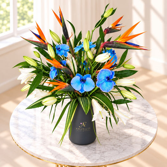 Luxury blue flowers in a charcoal vase available for delivery in Toronto and the GTA