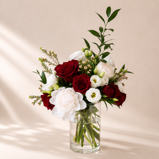 Luxury floral centerpiece Toronto with premium red and white flowers handcrafted by Amarilis Flowers.
