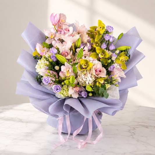 Luxury Orchid Bouquet with pink and green cymbidium orchids available for same day flower delivery in Toronto and Mississauga.