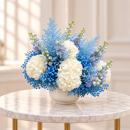 Side view of handcrafted newborn baby flowers with blue blooms and white hydrangeas