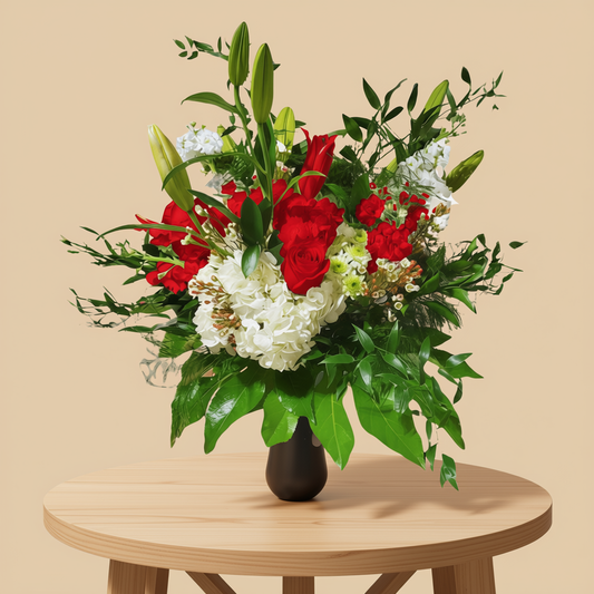 Elegant floral arrangement with red roses and hydrangeas