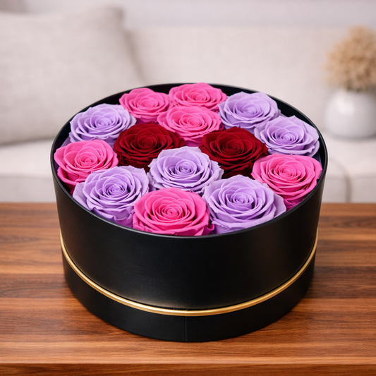 Preserved rose box Toronto with mixed red, pink and purple roses in luxury black hat box
