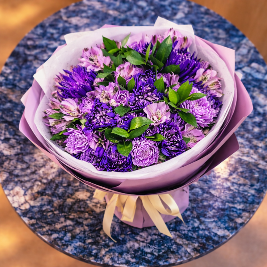 Top view elegant purple flower bouquet Toronto with luxury violet flowers and greenery