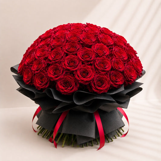 Red rose bouquet Toronto featuring 100 premium long-stem red roses handcrafted by Amarilis Flowers.