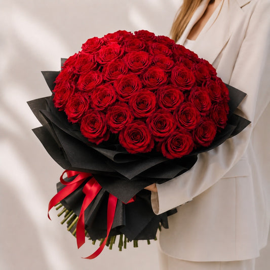 Romantic bouquet of premium red roses handcrafted for anniversaries, birthdays, and special occasions in Toronto.