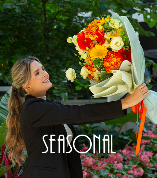 Colourful seasonal flower bouquet with orange and yellow blooms