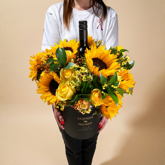 The Solar Toast sunflower and yellow rose arrangement with wine, same day flower delivery Toronto GTA