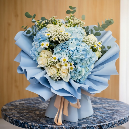 Romantic blue and white bouquet with soft floral tones