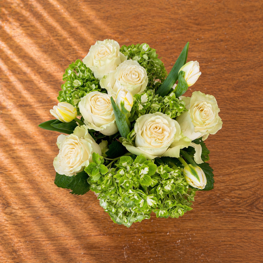white floral centerpiece top angle view elegant arrangement