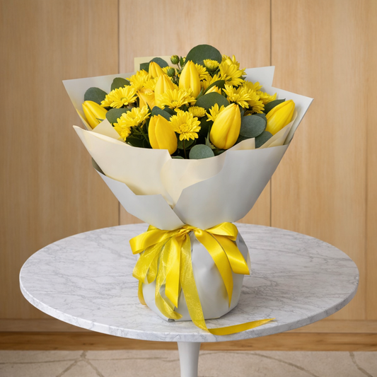 same day flowers Toronto Sunlit Zest yellow bouquet pedestal table wood background