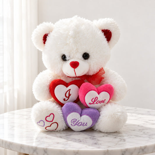 White 13-inch I Love You teddy bear gift in Toronto with a red bow and red, pink and purple plush hearts.