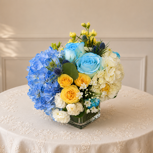 Elegant Blue centerpiece Toronto with hydrangeas and luxury roses