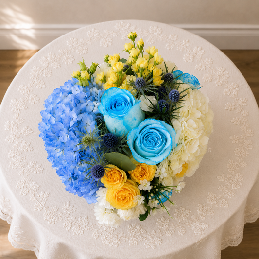 Top view of blue centerpiece Toronto with premium flowers