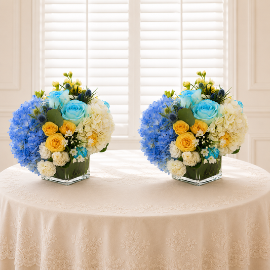 Luxury elegant blue centerpiece Toronto on elegant embroidered table