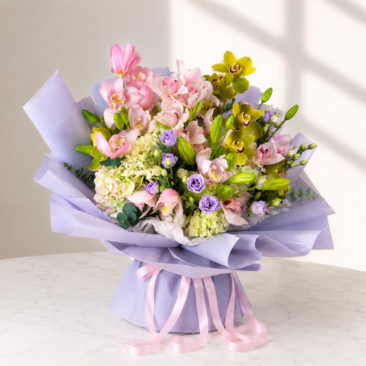 Elegant side view of a luxury orchid bouquet for same day flower delivery across Toronto, Mississauga and the GTA.