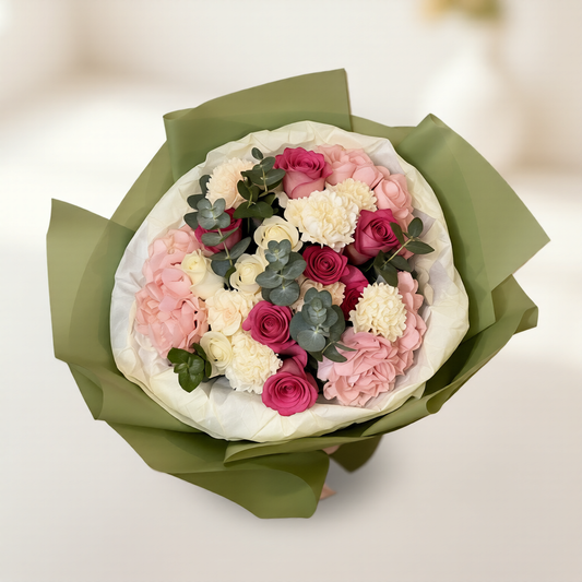 Romantic blush and ivory flowers arranged by a Toronto florist