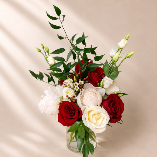 Romantic luxury floral centerpiece featuring fresh red and white flowers for delivery in Toronto and Mississauga.