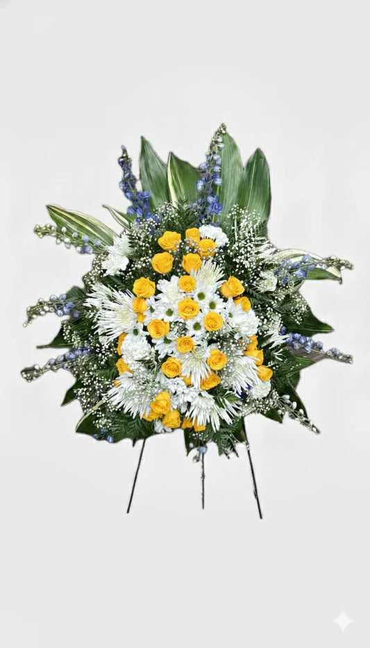 Front view of a serene standing funeral spray
